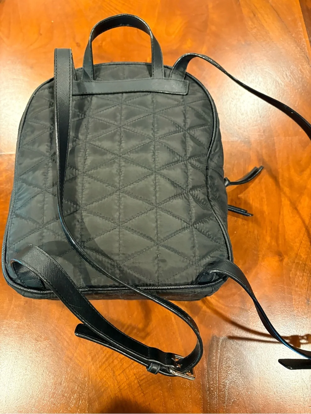 kate spade Black Quilted Med. Backpack, great condition
